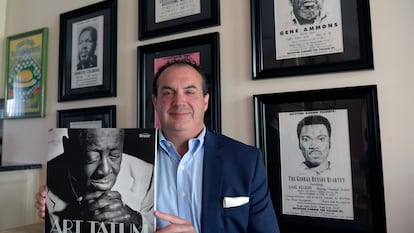 Music producer Zev Feldman with an unreleased Art Tatum album and a rare George Benson poster in the background; April 2024.