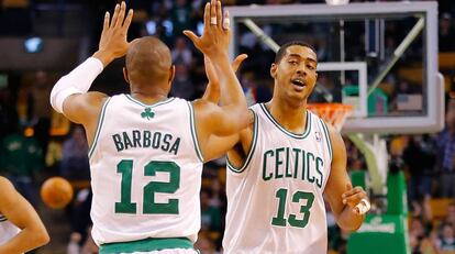 Fab Melo, com o número 13, quando jogava nos Celtics.