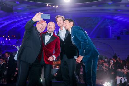 Peter Lindbergh, Georges Kern, Brad Pitt y Daniel Wu en la gala de Breitling.