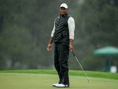 Tiger Woods reacts after missing a putt on the 18th hole during the weather delayed second round of the Masters golf tournament at Augusta National Golf Club on Saturday, April 8, 2023.