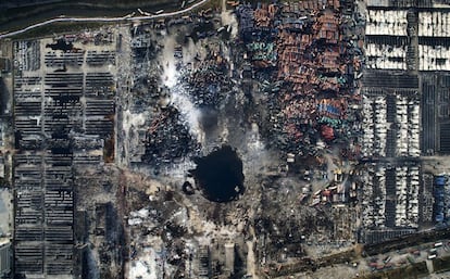 Imagem ganhadora do terceiro prêmio da categoria Notícias – Imagem Única, feita pelo fotógrafo chinês Chen Jie. A foto mostra uma vista aérea da destruição causada pela explosão em Tianjin (China), em 15 de agosto de 2015.