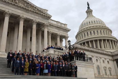 New members of the House of Representatives pose on Capitol Hill in Washington.