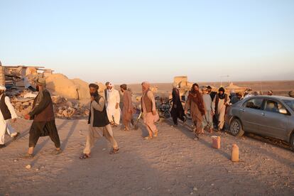 People affected by an earthquake wait for relief in Herat, Afghanistan, 07 October 2023.