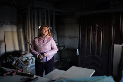 Valentina Bratkevich, a resident and administrator in Irpin, is adapting a basement for the winter. 