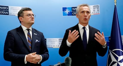 Ukraine's Foreign Minister Dmitro Kuleba with NATO Secretary General Jens Stoltenberg in Bucharest on Tuesday.