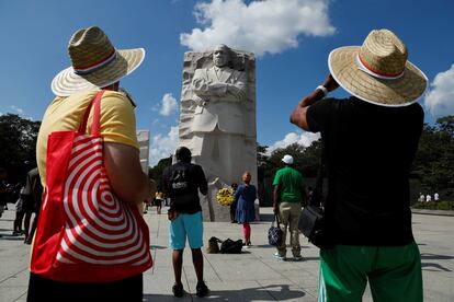 People visit Martin Luther King, Jr. Memorial as demonstrators for racial justice march on the 60th anniversary of the March On Washington and Martin Luther King Jr's historic "I Have a Dream" speech at the Lincoln Memorial in Washington D.C, U.S., August 26, 2023.