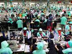 Garment employees work at Fakhruddin Textile Mills Limited in Gazipur, Bangladesh, February 7, 2021. Picture taken February 7, 2021. REUTERS/Mohammad Ponir Hossain