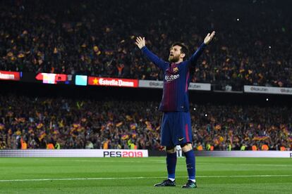 Lionel Messi celebrates a goal with Barcelona.