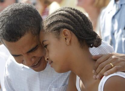 Barack Obama con su hija Malia