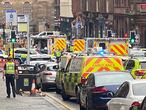 Emergency respoders are seen near a scene of reported stabbings, in Glasgow, Scotland, Britain June 26, 2020, in this picture obtained from social media. @JATV_SCOTLAND/via REUTERS THIS IMAGE HAS BEEN SUPPLIED BY A THIRD PARTY. MANDATORY CREDIT. NO RESALES. NO ARCHIVES.