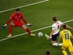 England's Harry Kane, center, scores his side's opening goal during the Euro 2020 soccer championship quarterfinal match between Ukraine and England at the Olympic stadium in Rome, Italy, Saturday, July 3, 2021. (Alessandro Garofalo/Pool Via AP)
