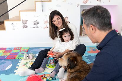 Carmen's family in the space set up for the little girl in their home in Benalmádena, Spain.