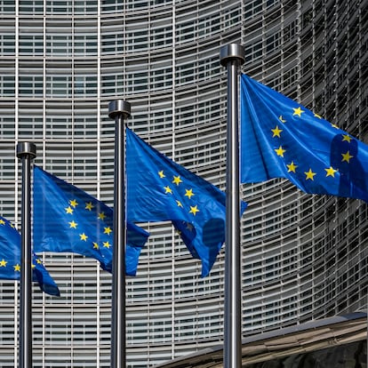 European flags in front of headquarters of European commission in Brussels in summer day