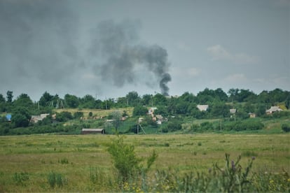 A column of smoke from a Russian shell, which destroyed several houses.