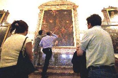 La obra <i>El martirio de San Lorenzo</i>, de Tiziano, en el Monasterio de El Escorial.
