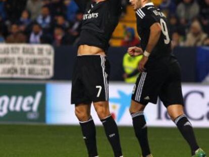 Cristiano y Benzema, durante el partido ante el Málaga.