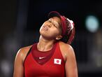 Tokyo 2020 Olympics - Tennis - Women's Singles - Round 3 - Ariake Tennis Park - Tokyo, Japan - July 27, 2021. Naomi Osaka of Japan reacts during her third round match against Marketa Vondrousova of Czech Republic REUTERS/Edgar Su