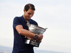 Paris (France), 12/10/2020.- Rafael Nadal of Spain poses with his trophy on the rooftop of the Galerie Lafayette department store one day after winning against Novak Djokovic of Serbia in their men's final match during the French Open tennis tournament at Roland ?Garros in Paris, France, 12 October 2020. (Tenis, Abierto, Francia, España) EFE/EPA/JULIEN DE ROSA