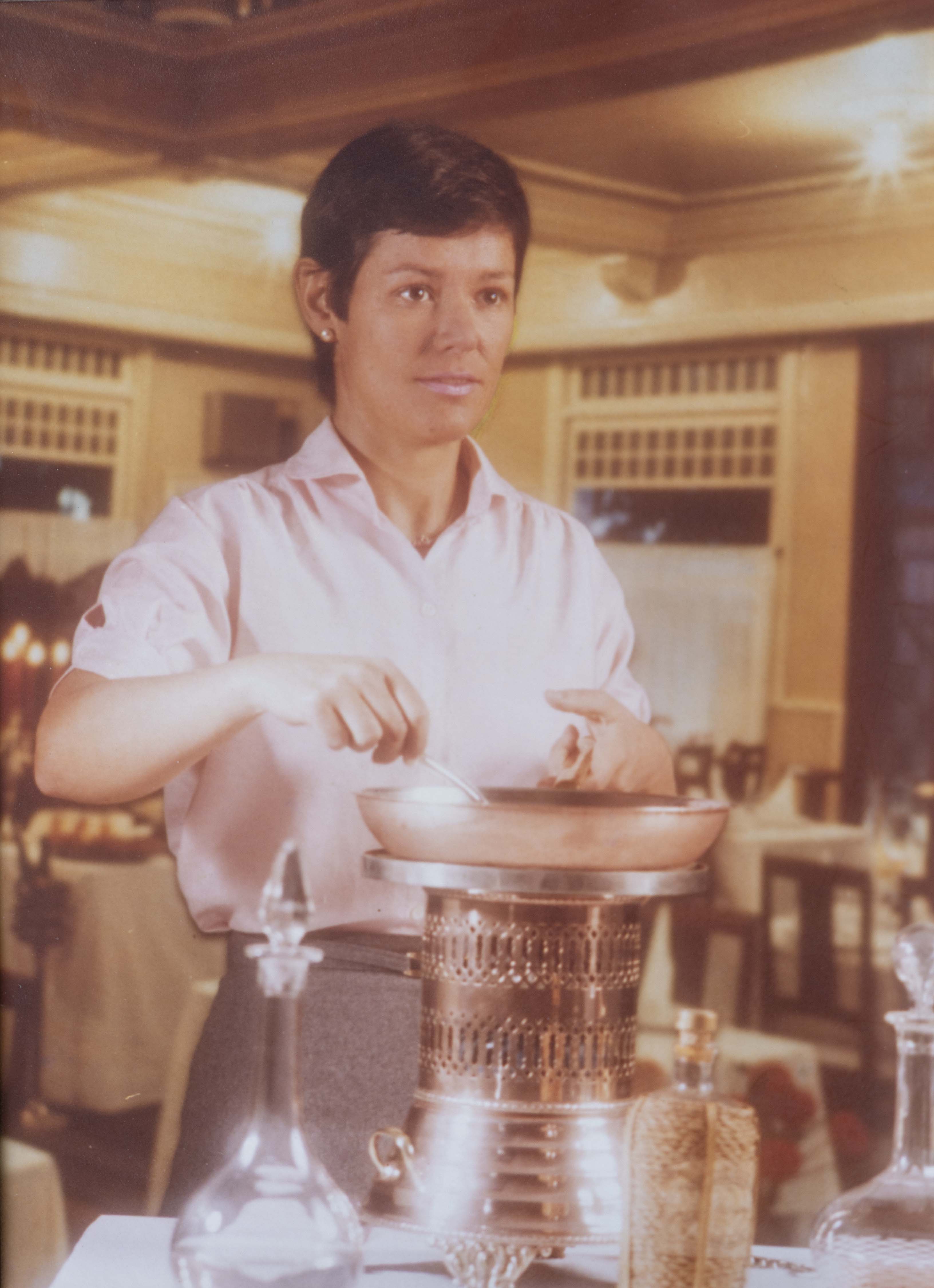 Tatus en una foto de joven en el restaurante Panier Fleuri.