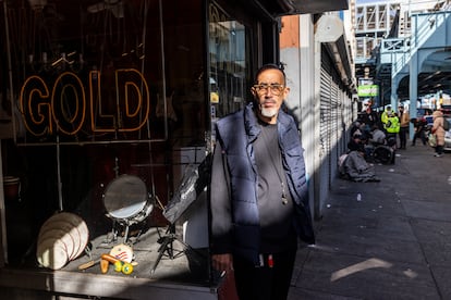 John Quinones runs a store selling second-hand goods and gold. He has been working in the store for 45 years and has witnessed the decline of the surrounding streets in recent years.
