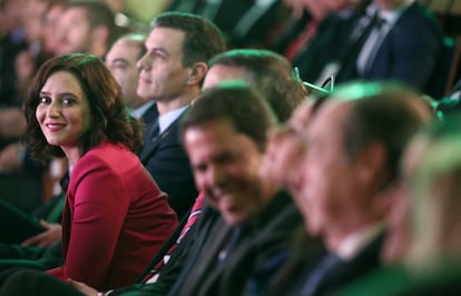 La presidenta de la Comunidad de Madrid, Isabel Díaz Ayuso, y el presidente del Gobierno, Pedro Sánchez, durante la clausura de la Asamblea de elecciones de la Asociación de Trabajadores Autónomos, en Madrid, el pasado 9 de marzo de 2020.