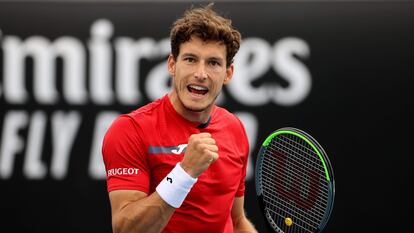 Spain's Pablo Carreno Busta reacts after a point against Japan's Kei Nishikori during their men's singles match on day one of the Australian Open tennis tournament in Melbourne on February 8, 2021. (Photo by David Gray / AFP) / -- IMAGE RESTRICTED TO EDITORIAL USE - STRICTLY NO COMMERCIAL USE --