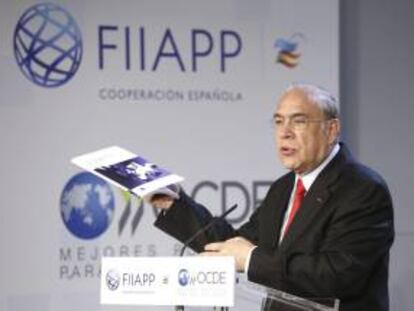 El secretario de la OCDE, Ángel Gurría, durante su intervención en la inauguración del Seminario de Buenas Prácticas Internacionales para la Reforma de la Administración Pública en los países OCDE, esta mañana en el Senado.