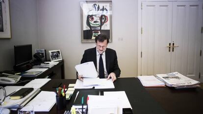 Spanish PM Mariano Rajoy at his desk.