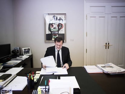 Spanish PM Mariano Rajoy at his desk.