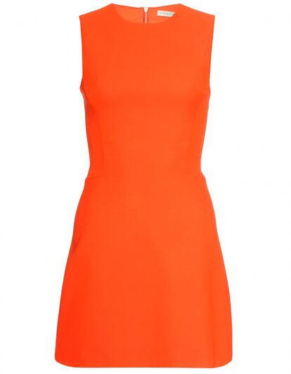 Alegre y veraniego. Así es este vestido naranja que firma Victoria Beckham. (1.024 euros).