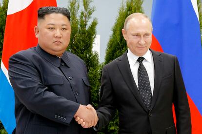 Russian President Vladimir Putin, right, and North Korea's leader Kim Jong Un