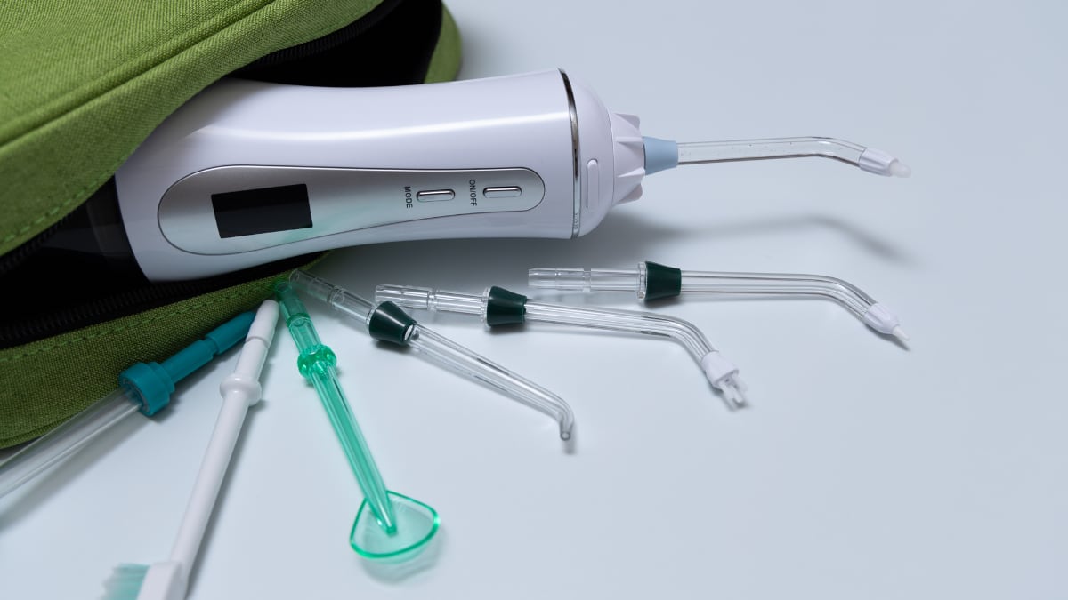 Irrigador dental mini.