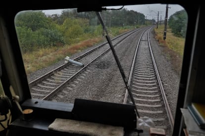 Remains of a missile and its impact on the railway tracks around Balakliia.