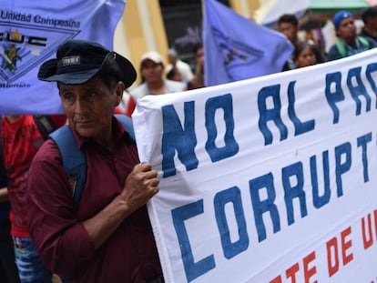 Protesta contra el presidente Jimmy Morales esta semana en Guatemala.