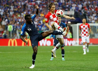 El croata Luka Modric junto al francés Blaise Matuidi.