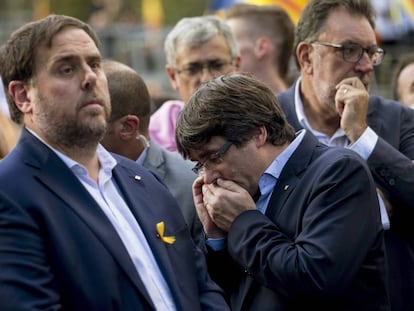 Catalan premier Carles Puigdemont (R) with his deputy Oriol Junqueras.