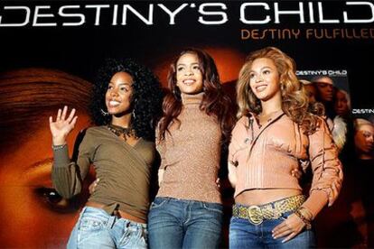 Beyoncé Knowles, Kelly Rowland y Michelle Williams posan durante la promoción de <i>Destiny Fulfilled</i> en Madrid.