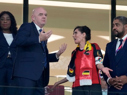 Belgium Foreign Minister Hadja Lahbib, wearing a "One Love" armband, talks with FIFA President Gianni Infantino, left, on the tribune during the World Cup group F soccer match between Belgium and Canada, at the Ahmad Bin Ali Stadium in Doha, Qatar, Wednesday, Nov. 23, 2022. (AP Photo/Natacha Pisarenko)