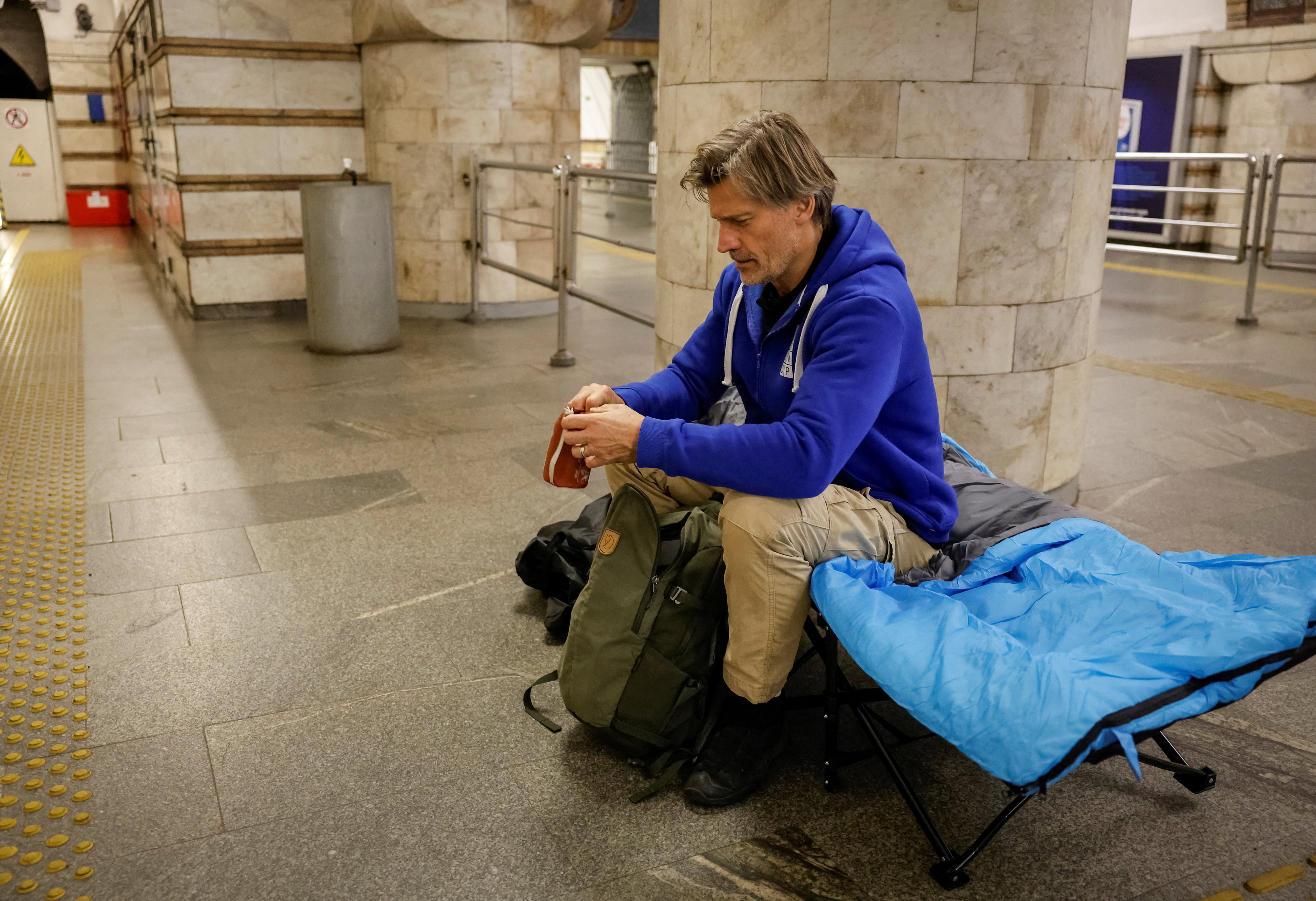 Actor Nikolaj Coster-Waldau takes shelter inside a metro station in Kyiv