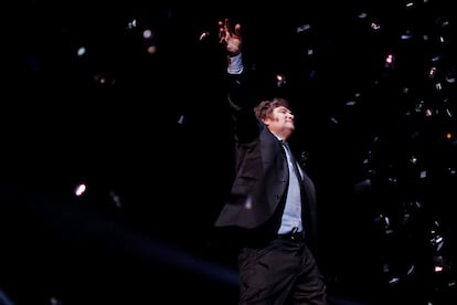  Javier Milei greets his followers during his closing ceremony at the Movistar Arena.