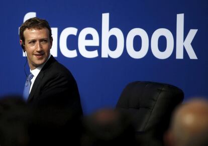 Facebook CEO Mark Zuckerberg is seen on stage during a town hall at Facebook's headquarters in Menlo Park, California September 27, 2015. REUTERS/Stephen Lam/File Photo