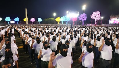 Nicaraguan government employees are sworn in as paramilitaries in Managua.