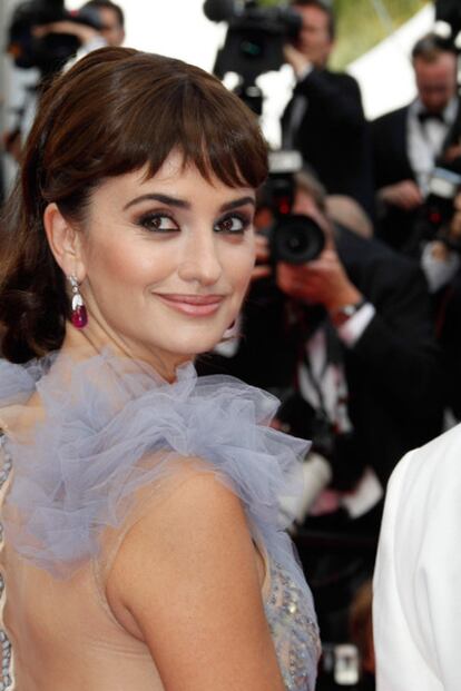 Penélope Cruz posing on the Cannes red carpet.