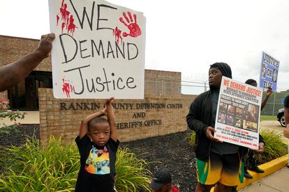 An anti-police brutality activist protests in front of the Rankin County Sheriff's Office in Brandon, Mississippi, on July 5, 2023