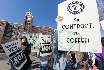 Members of different labor unions join Starbucks unionized employees for a labor protest outside Starbucks Corporate Headquarters, Wednesday, March 22, 2023, in Seattle.