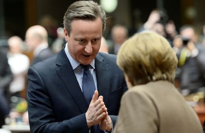 David Cameron y Angela Merkel en la cumbre.