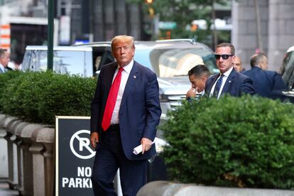 Former U.S. president Donald Trump walks outside as the trial of himself in a civil fraud case continues, in New York City, U.S., October 3, 2023.