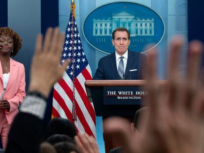 National Security Advisor for Strategic Communications John Kirby (R) and White House Press Secretary Karine Jean-Pierre (L) in a news conference on April 10.