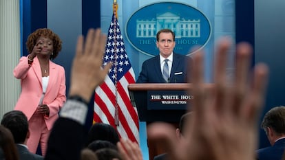 National Security Advisor for Strategic Communications John Kirby (R) and White House Press Secretary Karine Jean-Pierre (L) in a news conference on April 10.