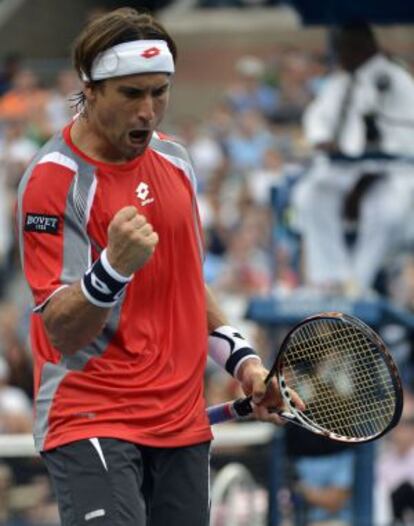 Ferrer celebra un punto ante Tipsarevic.